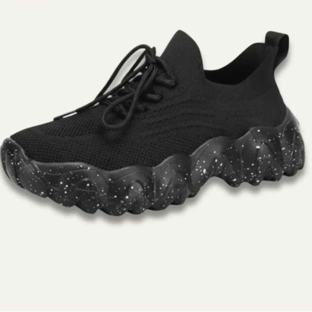 Armadillo size 7 black non-slip sneakers.
